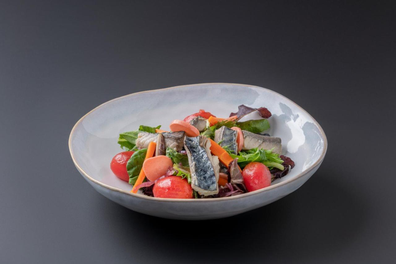 Eurostars Portico Alicante Exterior photo A salad with sardines